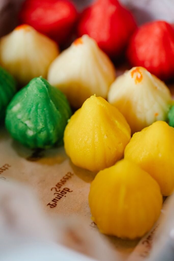 Vibrant array of multicolored modak, a traditional Indian sweet, perfect for festive celebrations.